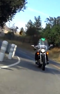 Deb  Snyder riding her Honda  shadow VLX on Mullholland drive